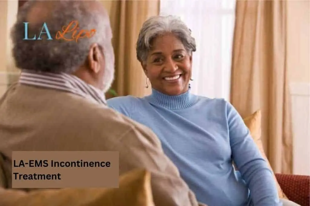 Couple sat smiling at each other - LA-EMS treatment West Norwood