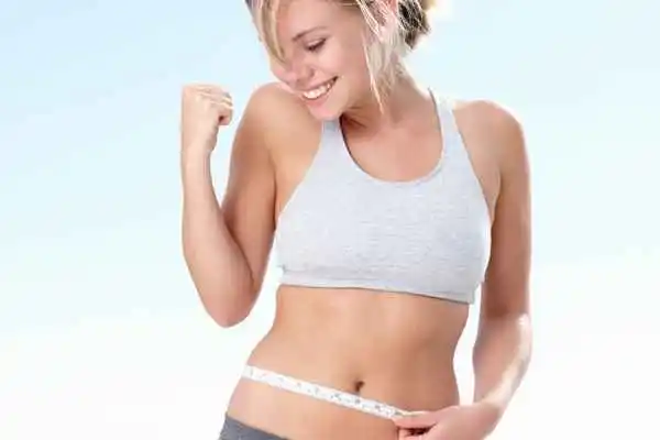 woman happy after fat reduction treatment West Norwood