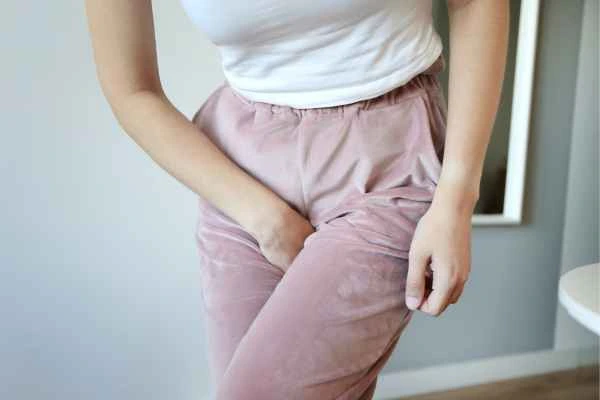 older woman running to the toilet because of urinary incontinence West Norwood