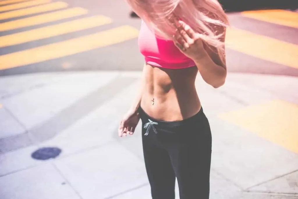 Woman with toned stomach after LA-EMS Body Sculpting Treatment West Norwood